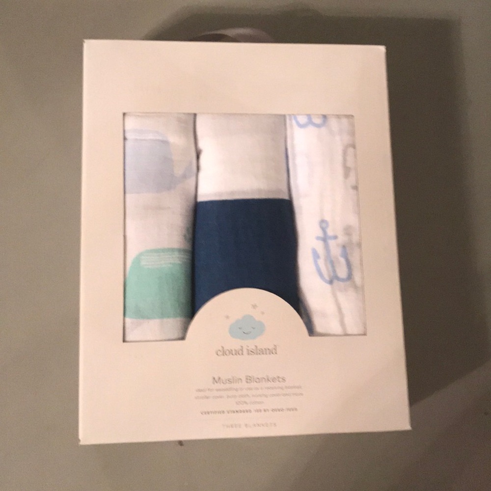 New never opened 3-pack muslin swaddling blankets
